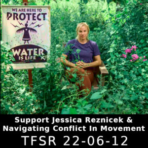 Photo by Cristina Yurena Zerr of Jessica Reznicek sitting among green plants and purple flowers next to a banner reading “We Are Here To Protect | Water Is Life”, other text reading “Support Jessica Reznicek & Navigating Conflict In Movement | TFSR 22-06-11”